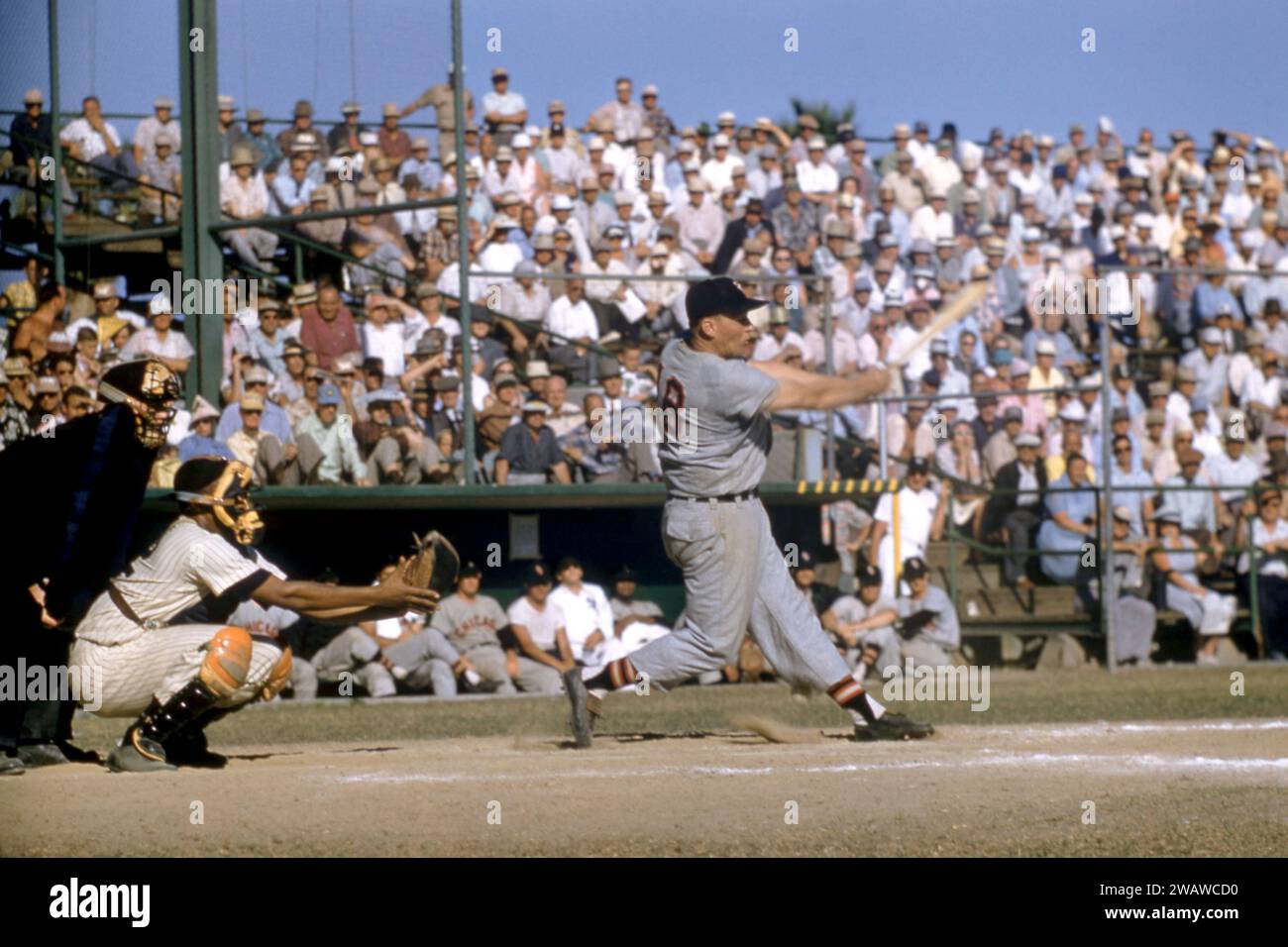 ST. PETERSBURG, FL - MARCH 12: Bob Nieman #18 of the Chicago White Sox swings at the pitch during an MLB Spring Training game against the New York Yankees on March 12, 1956 in St. Petersburg, Florida. The Yankees catcher is Elston Howard #32.  (Photo by Hy Peskin) *** Local Caption *** Bob Nieman;Elston Howard Stock Photo