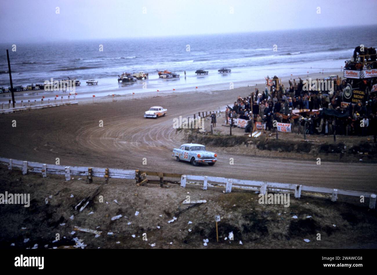 DAYTONA BEACH, FL - FEBRUARY 26: Junior Johnson in the #55 Pontiac races around the corner during the 1956 NASCAR Daytona Beach and Road Course race on February 26, 1956 in Daytona Beach, Florida. (Photo by Hy Peskin) *** Local Caption *** Junior Johnson Stock Photo