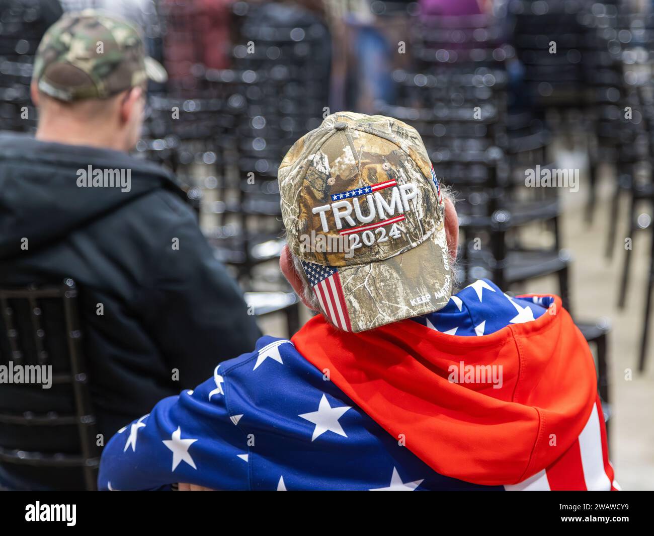 Man with a Trump 2024 hat at a Donald Trump campaign rally held by ...