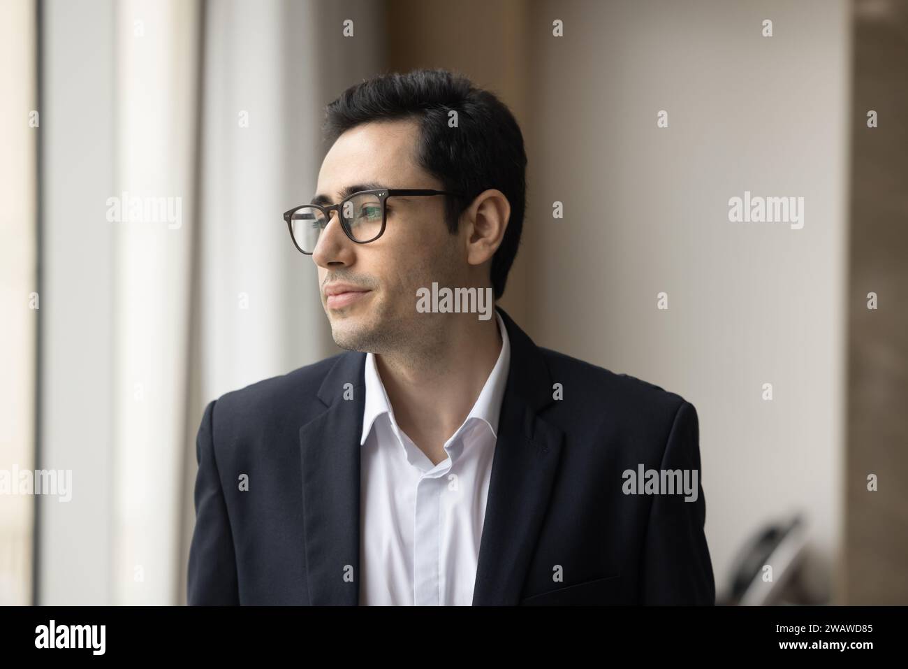 Thoughtful young Arab business man thinking on work problems solving Stock Photo