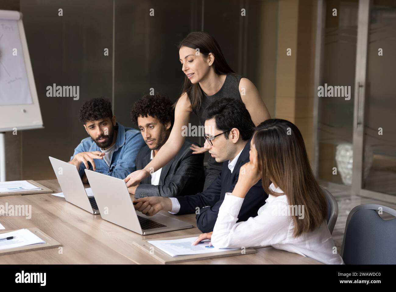 Diverse team employees watching hi-res stock photography and images - Alamy