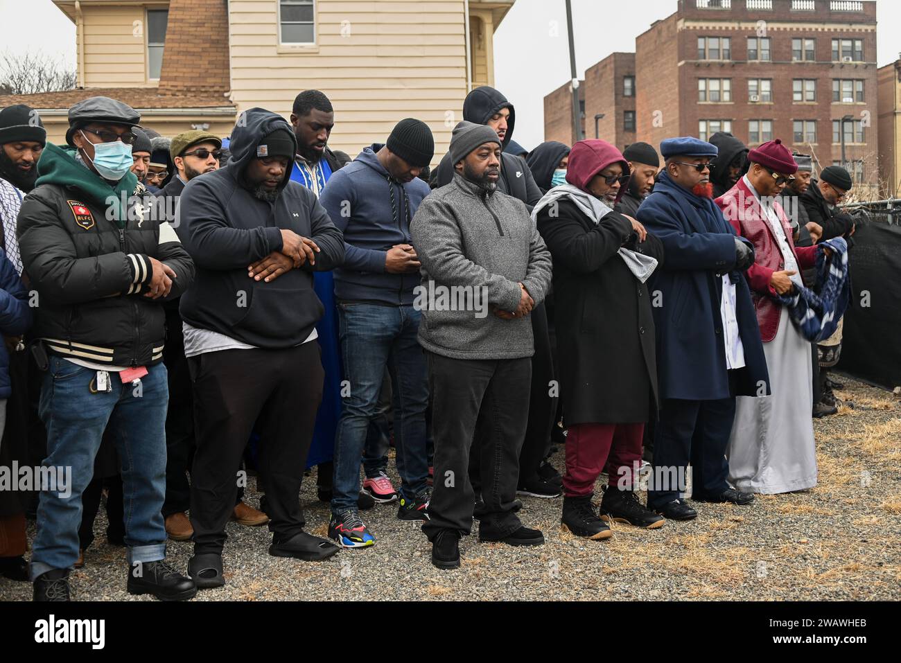 Newark, United States. 06th Jan, 2024. Mourners pay their respects at the Janazah (funeral) of Imam Hassan Sharif at NIA Masjid and Community Center in Newark. Mourners hugged, prayed, and worshipped outside of the building for the Janazah of the late Imam Hassan Sharif who was murdered outside of Masjid Muhammad-Newark mosque. The body of the late Imam Hassan Sharif was carried inside the building, then outside when the Janazah concluded. Credit: SOPA Images Limited/Alamy Live News Stock Photo