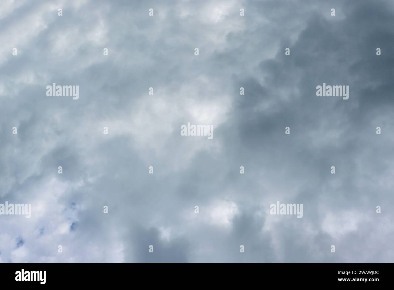 Sun shines through rain clouds hi-res stock photography and images - Alamy