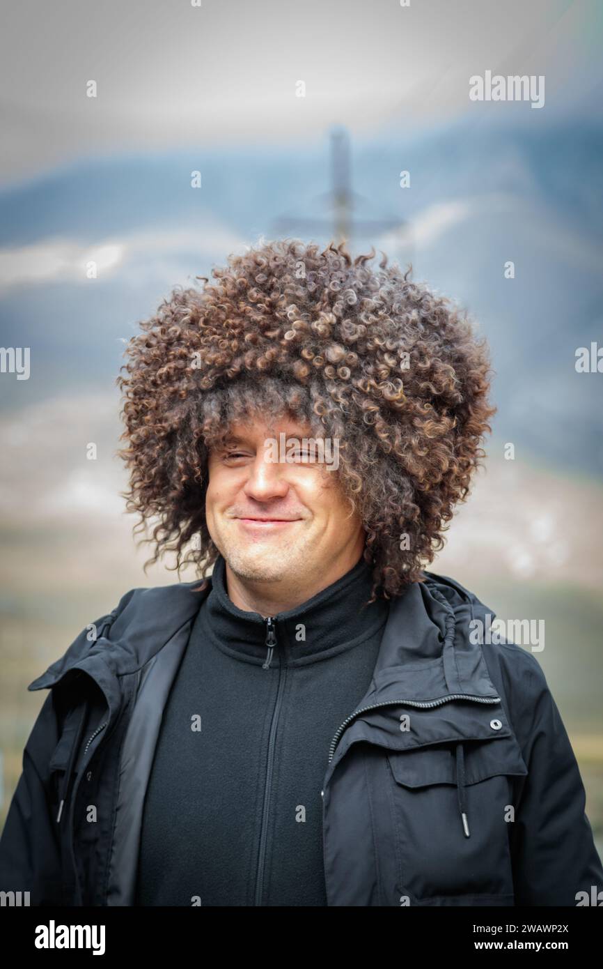 A man wearing a traditional Ossetian hat made of fur, a symbol of Caucasian culture and national identity Stock Photo