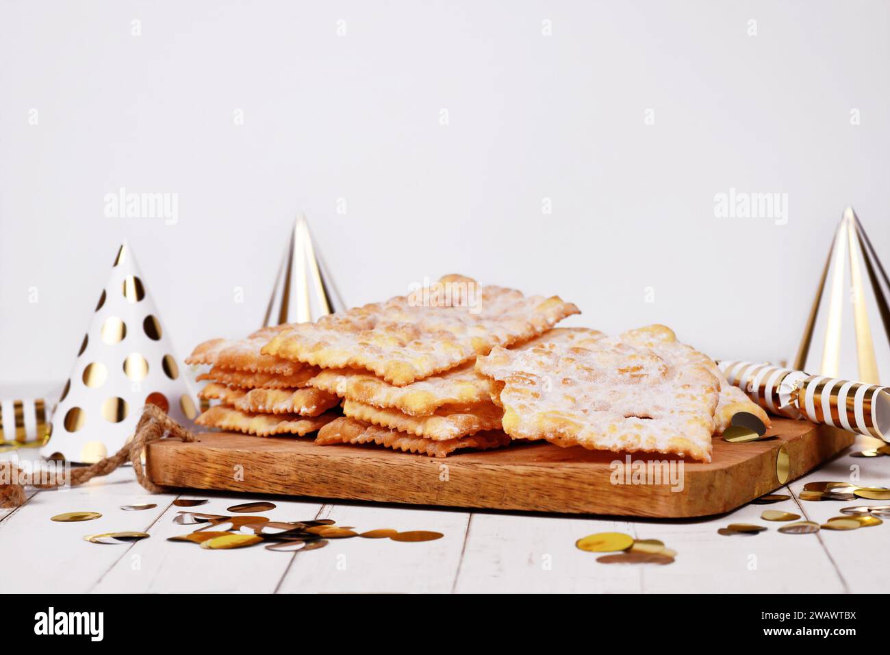 Fried Italian dessert snack for carnival season called 'Galani', ' Chiacchiere' or 'Crostoli' depending on region. Also known as Angel Wings pastry Stock Photo