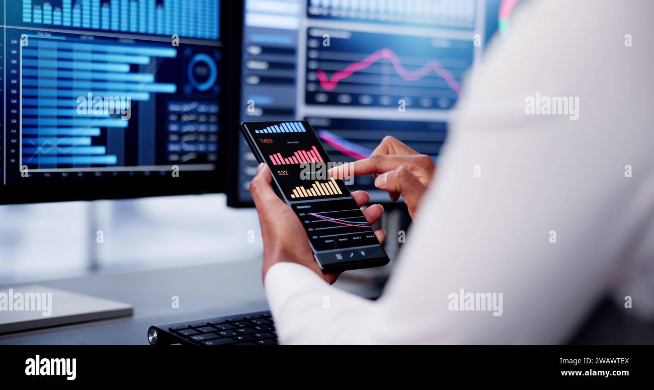African Advisor Using KPI Dashboard With Financial Analytics Graphs Stock Photo