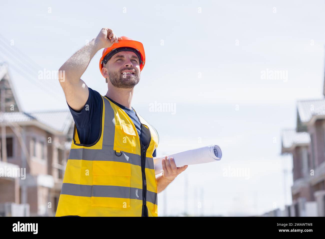 Professional construction worker engineer male. Real estate house