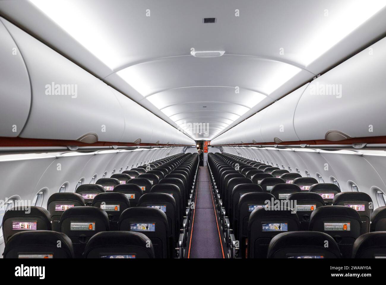 View into an empty aircraft compartment of an easyJet Airbus A320 neo in the newly opened easyJet maintenance hangar. The entire European easyJet Stock Photo