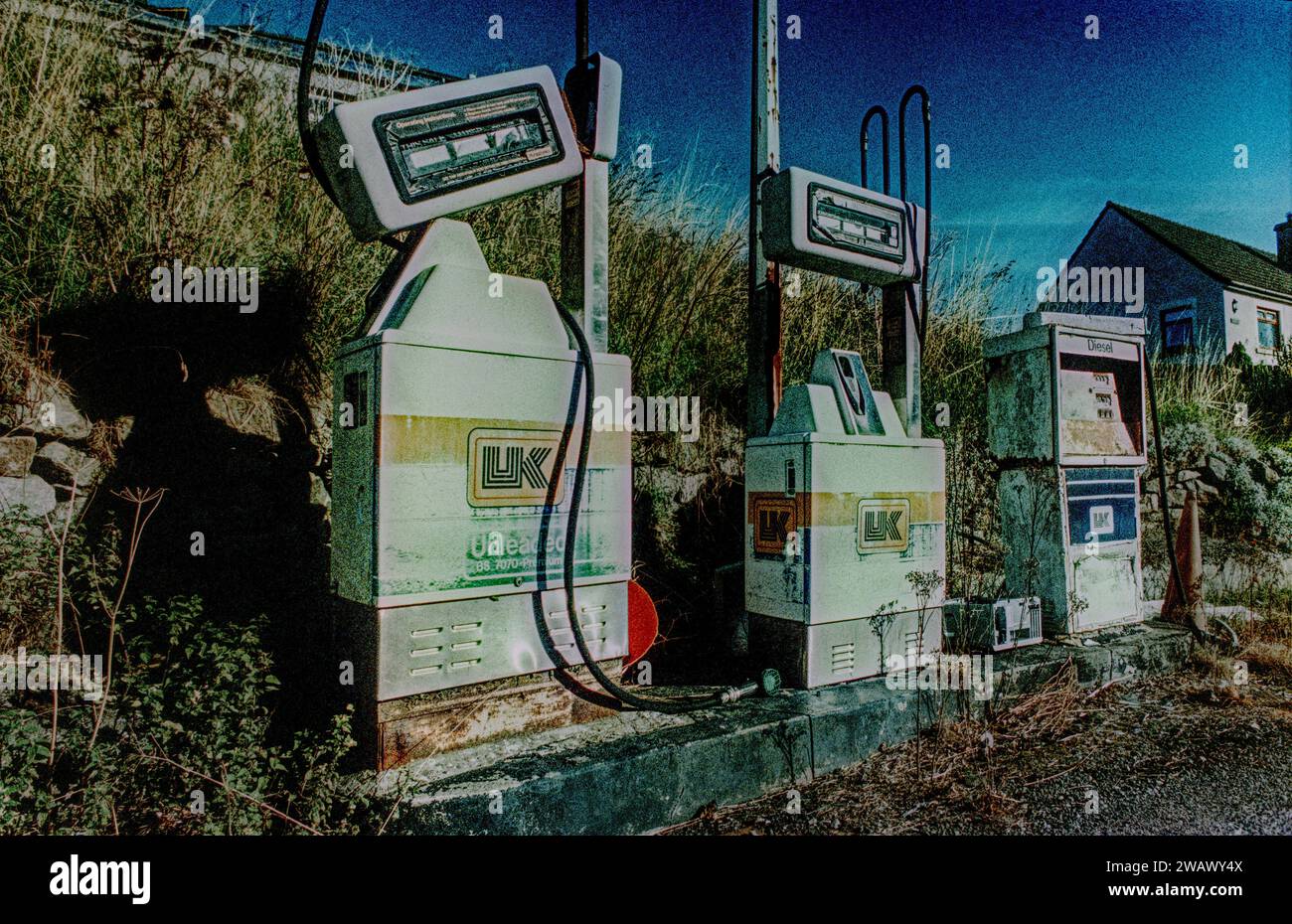 Old and derelict petrol pumps Stock Photo