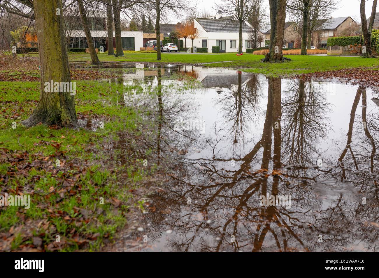 Extreme rainfall in the Netherlands in December 2023 with flooded park in a residential l area Stock Photo