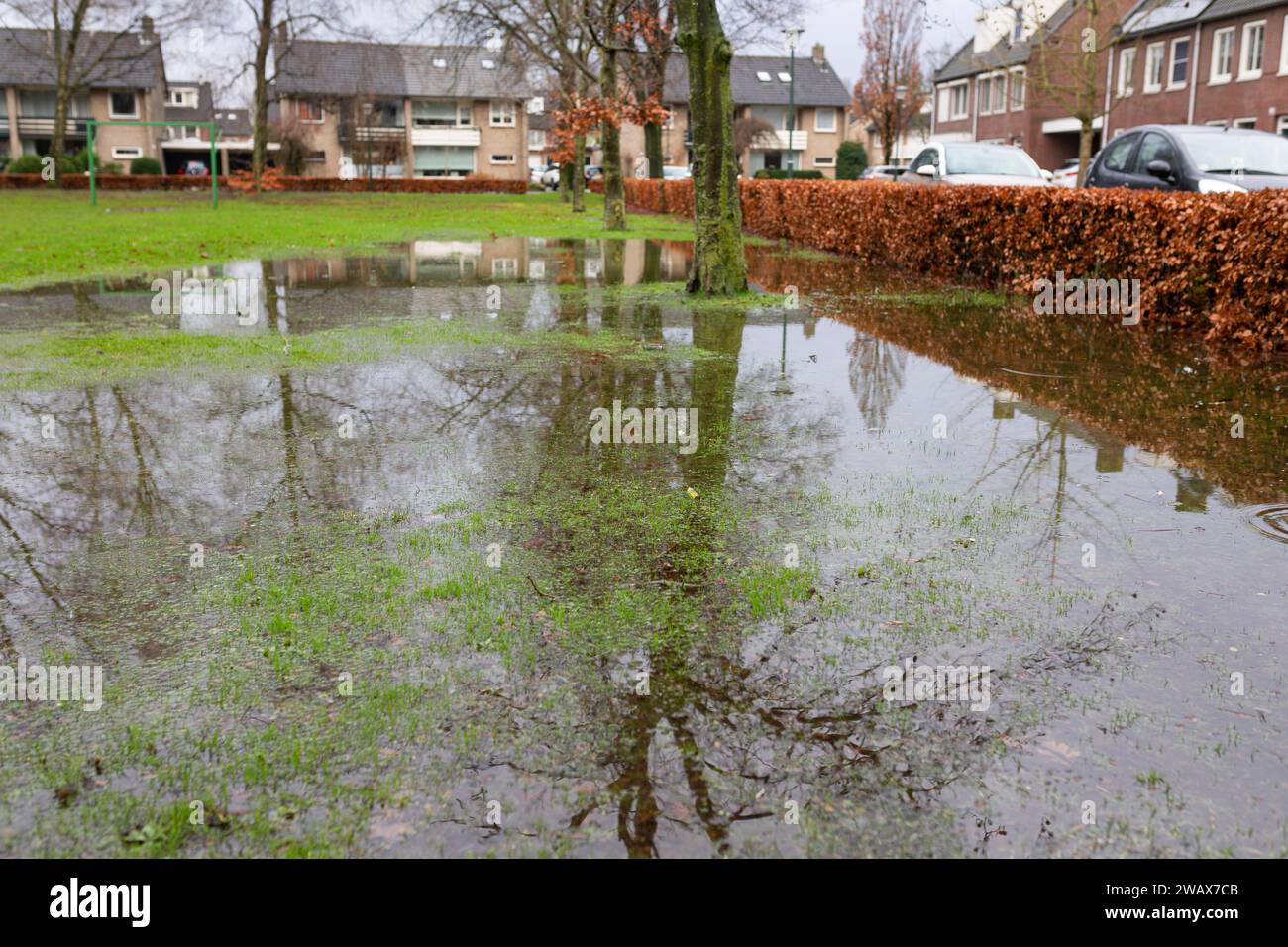 Extreme rainfall in the Netherlands in December 2023 with flooded park in a residential l area Stock Photo