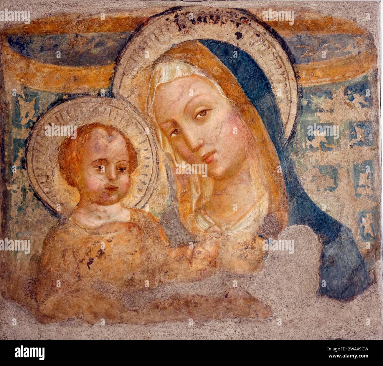 Italy Umbria Foligno: Palazzo Trinci. Home to an art gallery and archaeological museum  Madonna with child. 15th century∞ second half. Fresco detached from the church of Madonna del Sasso. Stock Photo