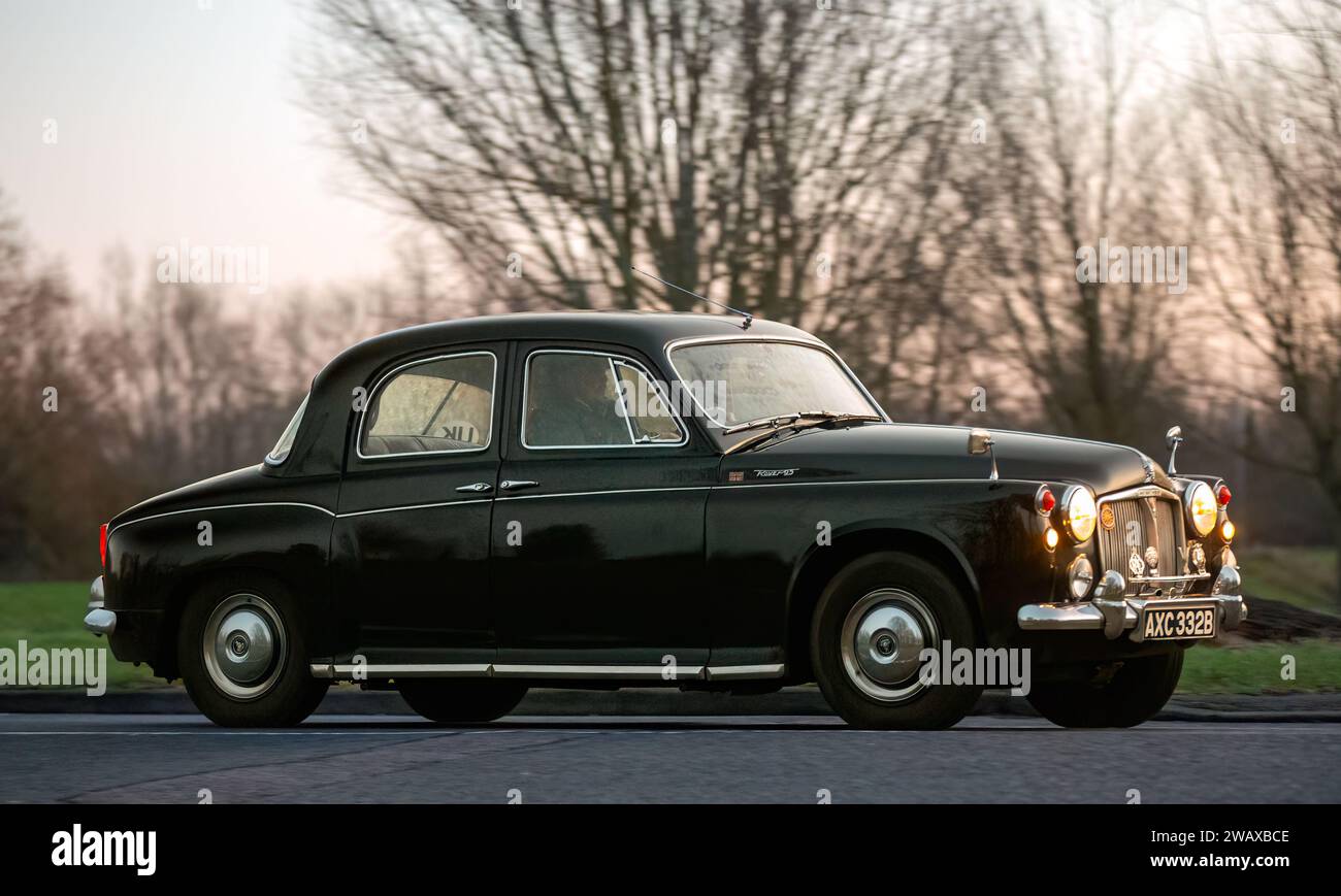 Stony Stratford,UK Jan 1st 2024.1964 black Rover 95 car arriving at Stony Stratford for the annual New Years Day vintage and classic vehicle festival. Stock Photo