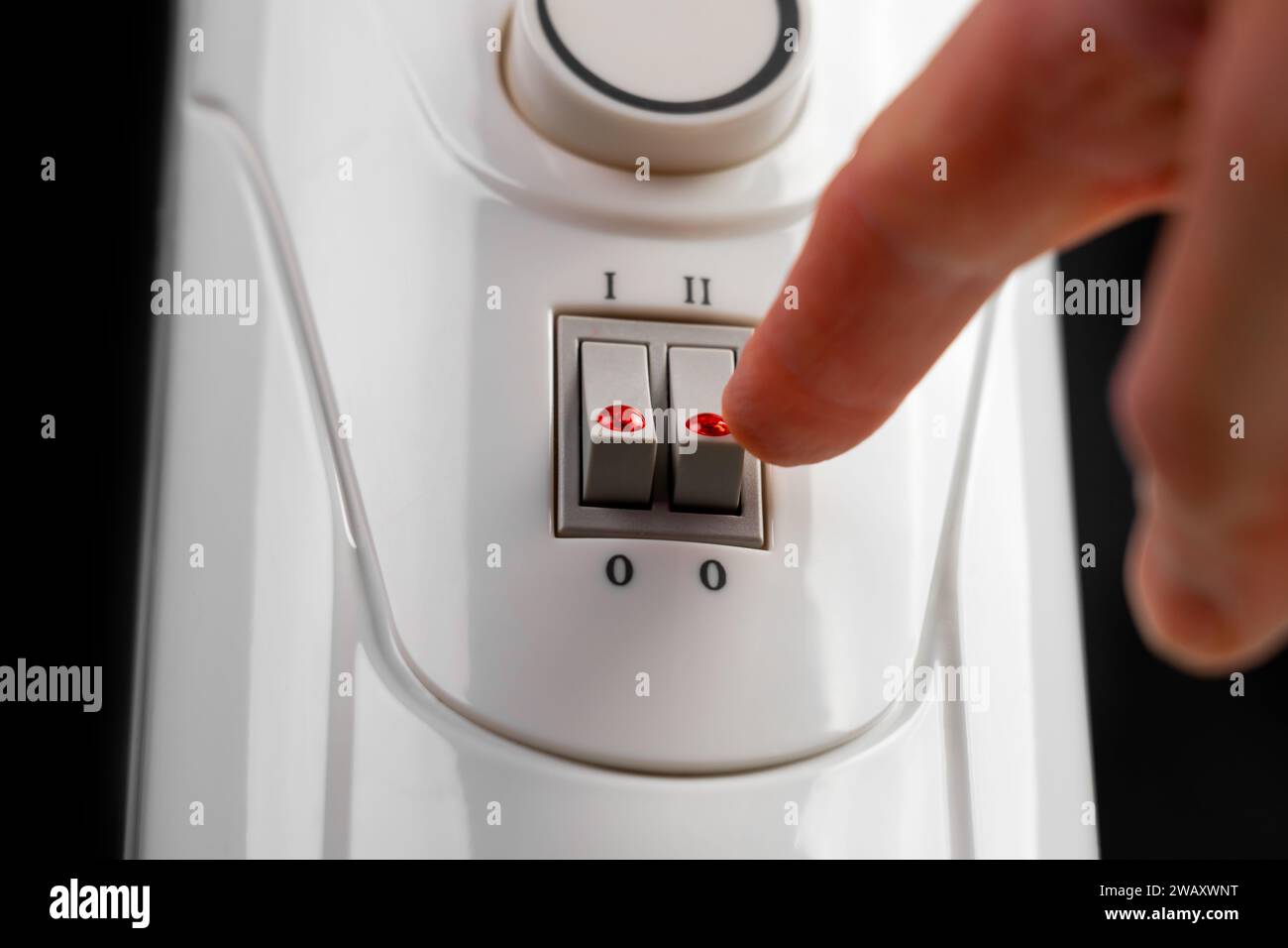 Turning off the indoor electric heater by clicking the switch down