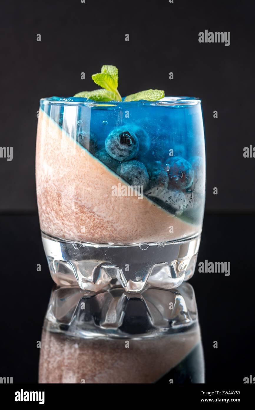 Blueberry chocolate panna cotta dessert in the glass Stock Photo