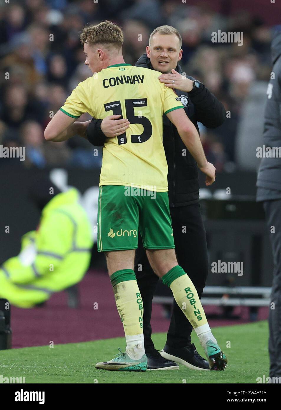 London, UK. 7th Jan, 2024. Tommy Conway of Bristol City shakes hands with Liam Manning, Manager of Bristol City after being substituted during the The FA Cup match at the London Stadium, London. Picture credit should read: Paul Terry/Sportimage Credit: Sportimage Ltd/Alamy Live News Stock Photo
