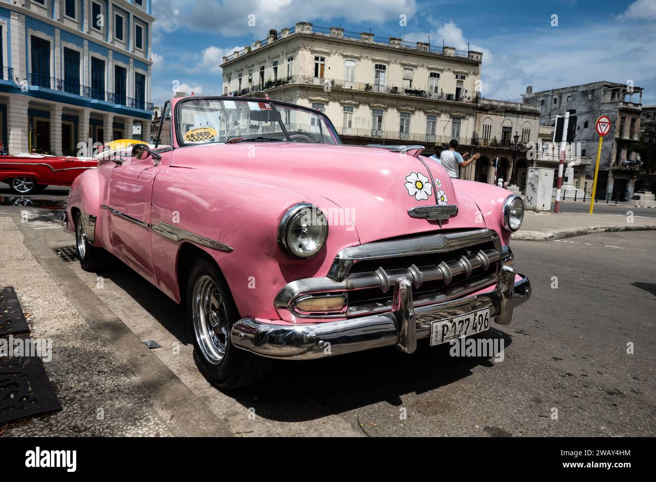 HAVANA, CUBA - AUGUST 27, 2023: Pink Chevrolet Fleetline 1951 Convertible in the streets of La Habana, Cuba Stock Photo