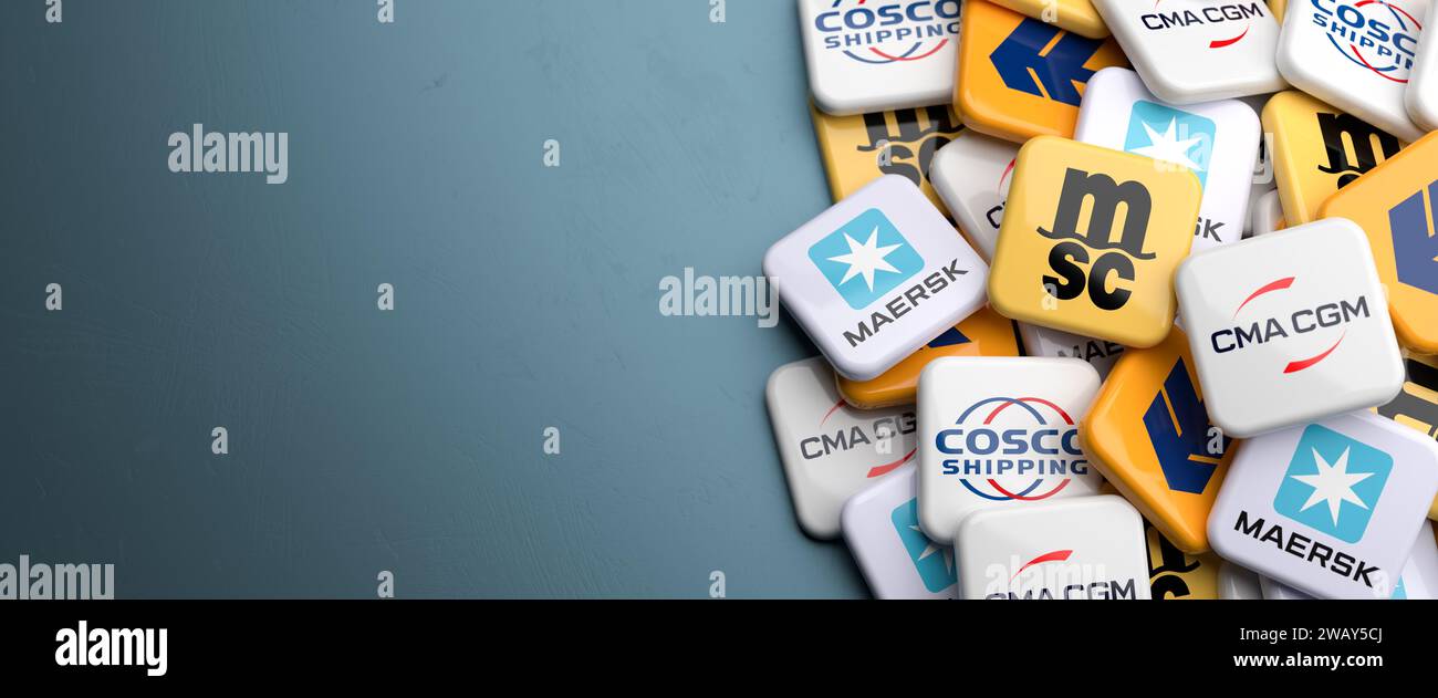 Logos of the five largest container shipping companies on a heap on a