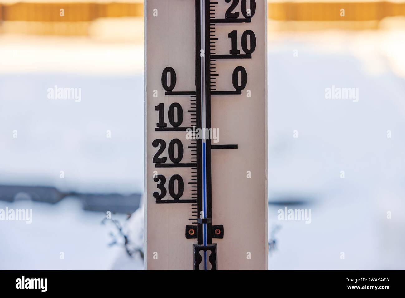 Close-up view of outdoor thermometer indicating minus 14 degrees Celsius. Stock Photo
