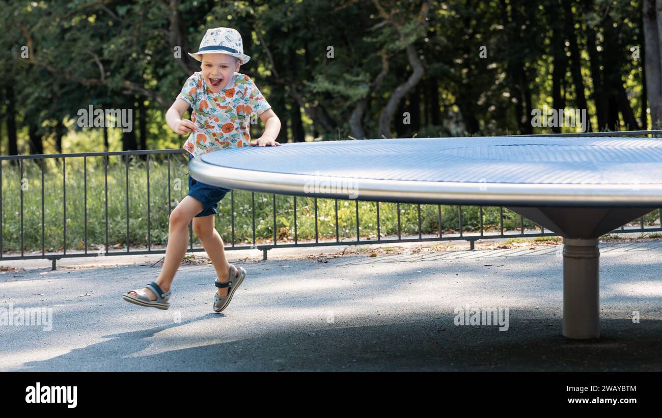 Playground spin hi-res stock photography and images - Alamy