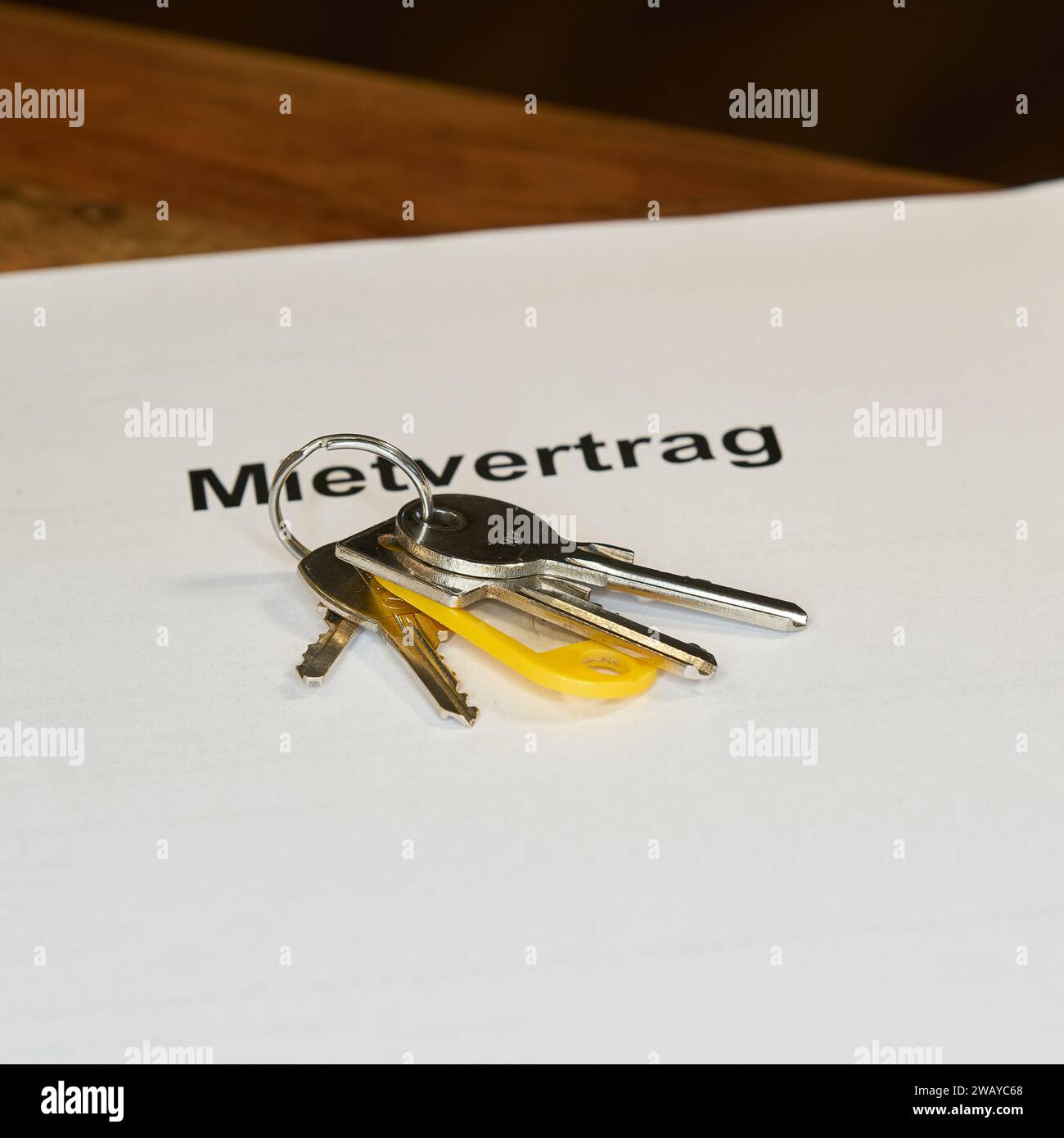 Keys and german rental contract, Mietvertrag, for a new apartment are on a table Stock Photo