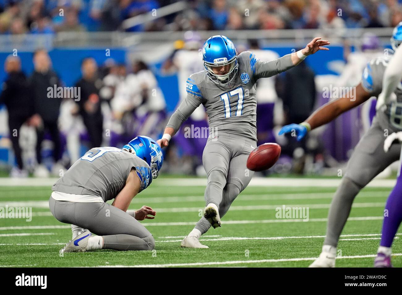 Detroit Lions place kicker Michael Badgley (17) kicks the extra point