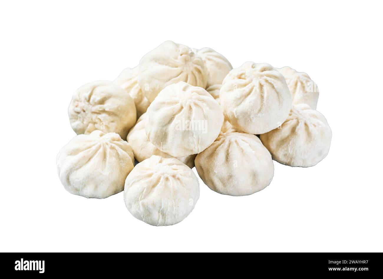Frozen uncooked baozi dumplings stuffed with meat. Isolated on white