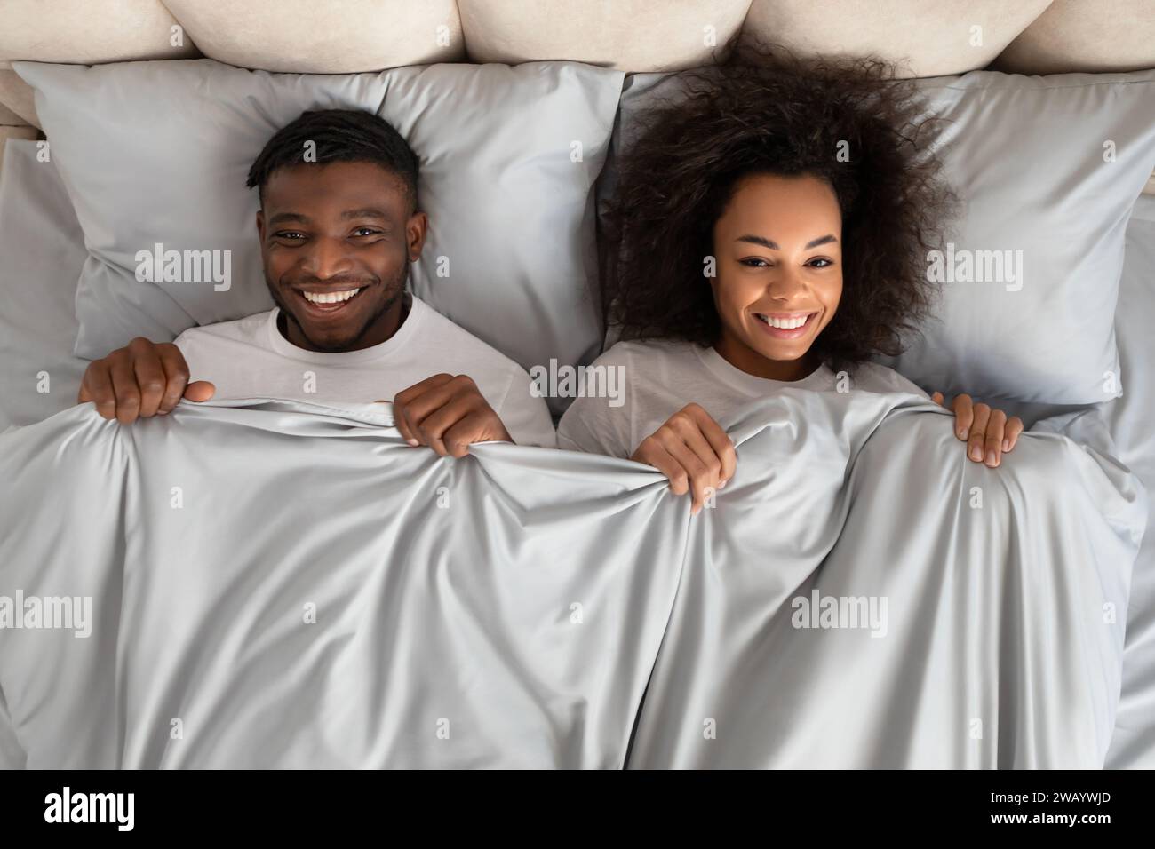 Top View African Couple Lying In Bed Covered With Blanket Stock Photo ...