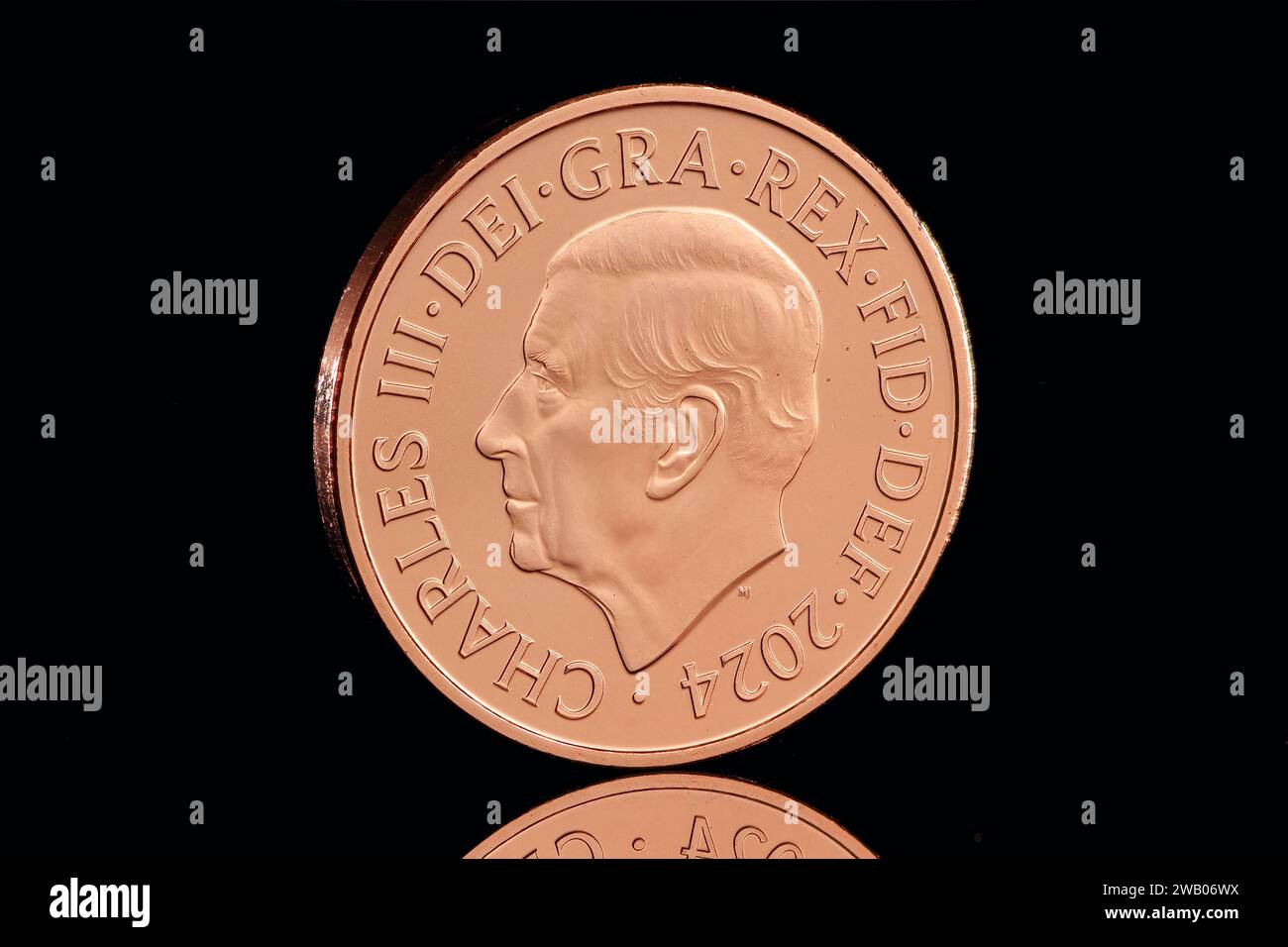 Sleeping Doormouse 1 pence in the 2024 Definitive Annual UK Coin Set featuring the first coin portrait of King Charles III by Martin Jennings Stock Photo