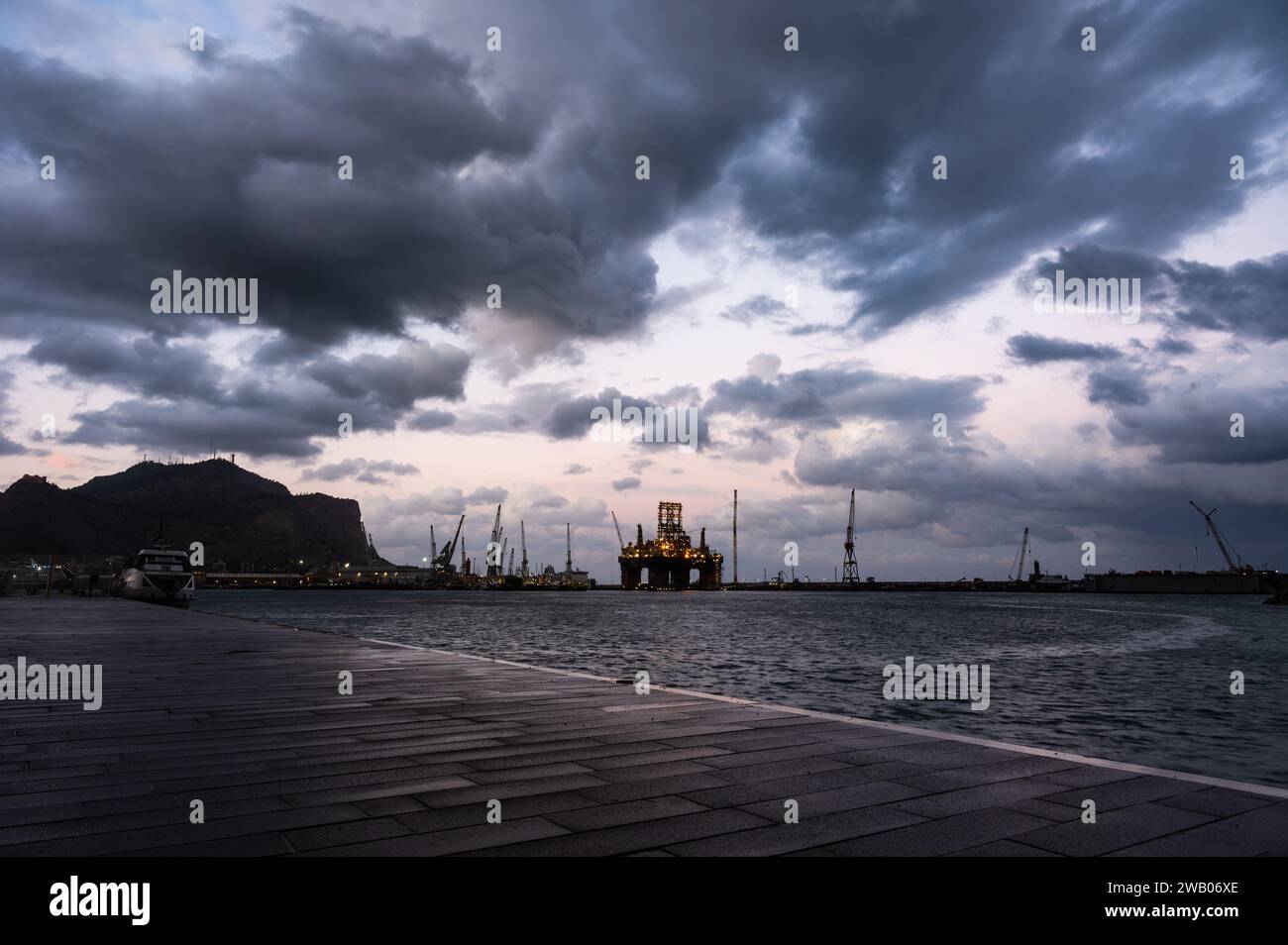 Palmero, Sicily, Italy, December 16, 2023 - The promenade at the port during a stormy evening Stock Photo