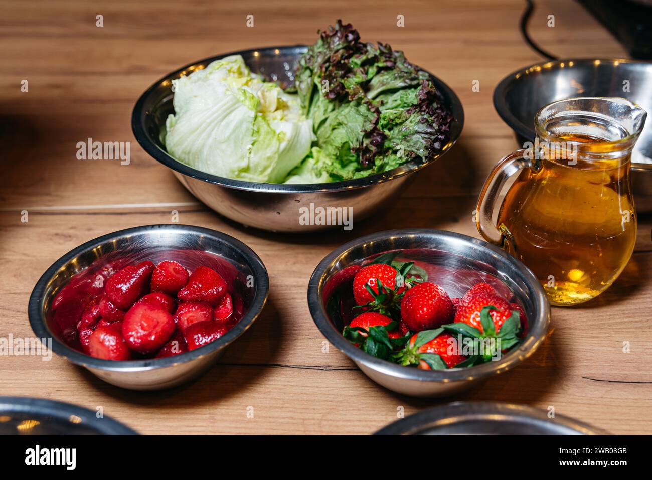 Raw food ingredients set in steel bowls before cooking Stock Photo - Alamy