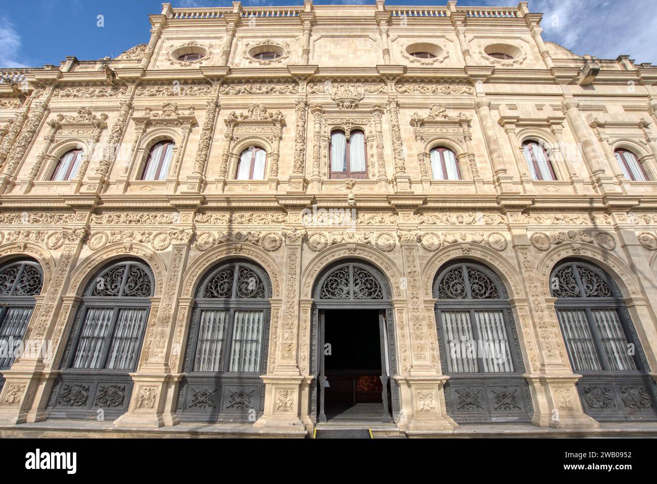 Sevilla, Spain - September 1, 2023: The ornate City Hall building of Sevilla, Spain located in the Plaza Nueva Stock Photo