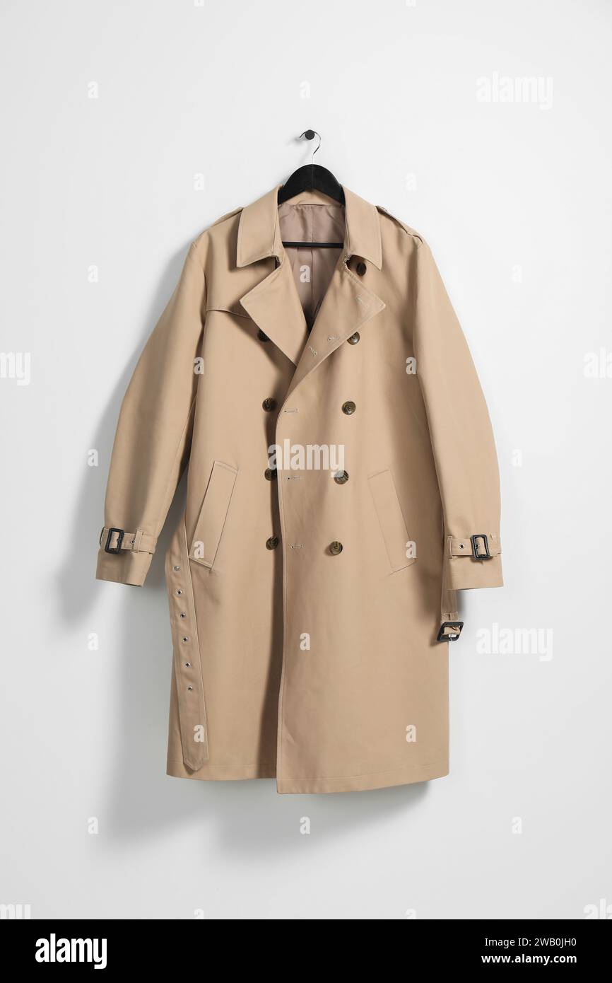 Beige trench coat hi-res stock photography and images - Alamy