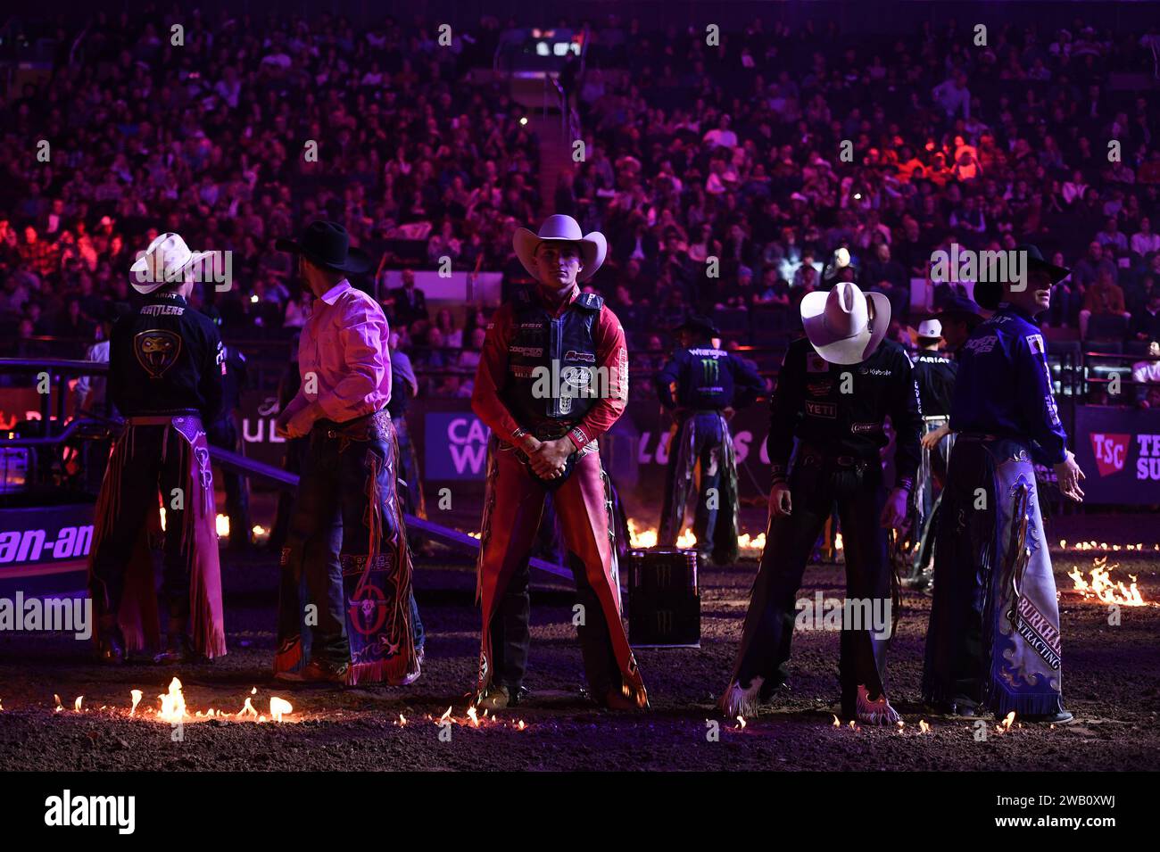 New York, USA. 07th Jan, 2024. Professional bull riders stand in line ...