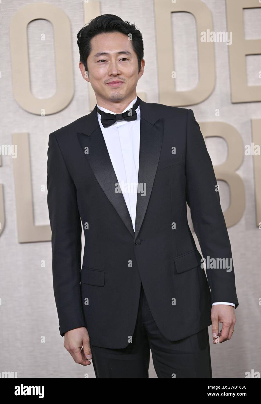 Beverly Hills, United States. 07th Jan, 2024. Actor Steven Yeun arrives for the 81st annual Golden Globe Awards at the Beverly Hilton in Beverly Hills, California on Sunday, January 7, 2024. Photo by Chris Chew/UPI Credit: UPI/Alamy Live News Stock Photo