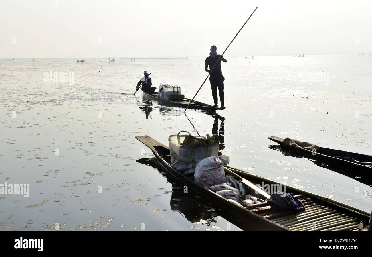 January 7, 2024, Guwahati, Guwahati, India Fishermen fishing at Deeporbeel during annual