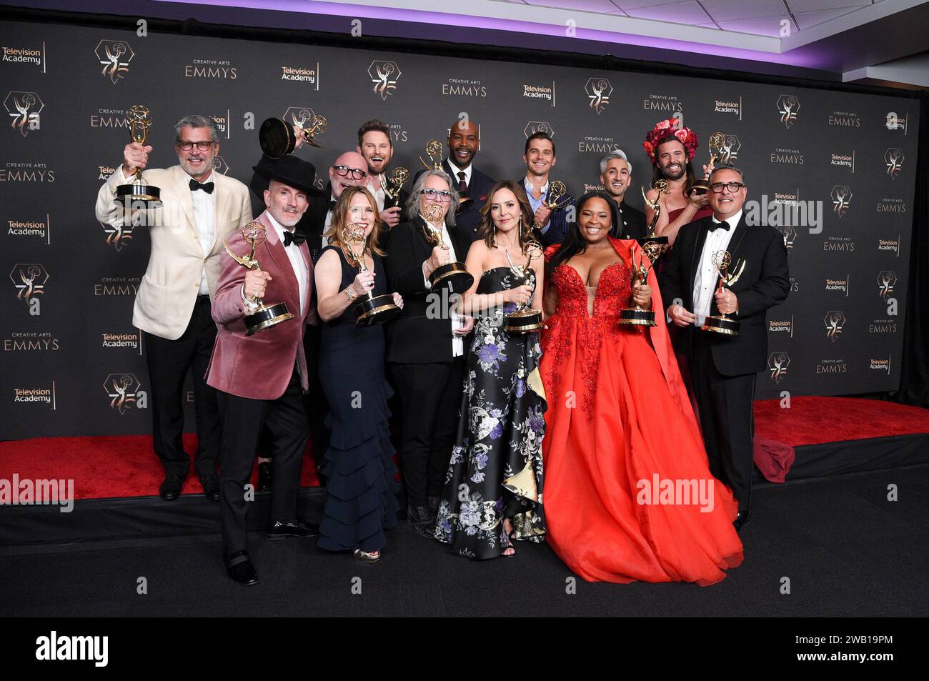 The team from Queer Eye pose in the press room with the award for ...