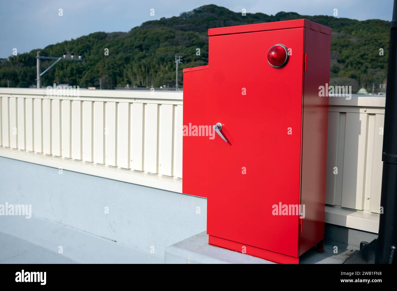 A fire hydrant box is placed on the rooftop of a building. Stock Photo