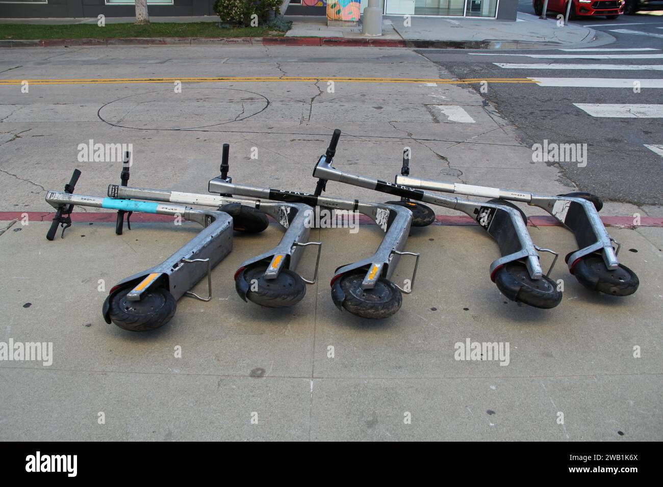 Motorized Scooters Bird Lime Stacked On Side In Street Stock Photograph Stock Photo Alamy