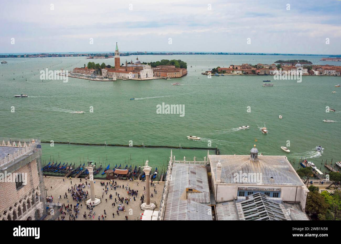 Aerial view from the Bell Tower (Campanile di San Marco) with Piazza San Marco, gondolas and the island with San Giorgio Maggiore church, in Venice Stock Photo
