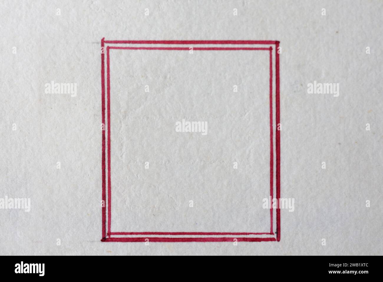 antique square frame red made with nib on paper Stock Photo