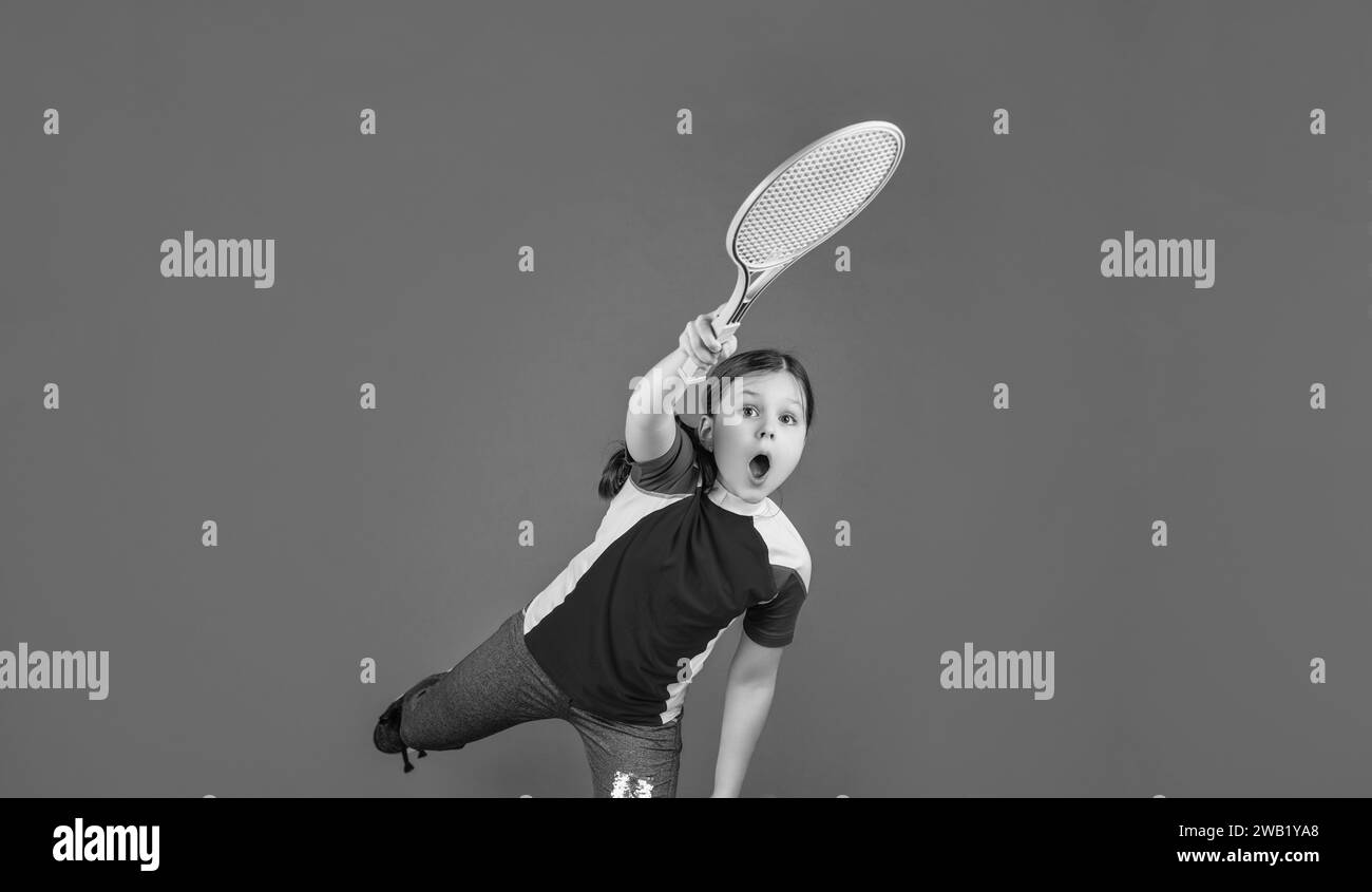 kid playe tennis with racket on pink background Stock Photo - Alamy