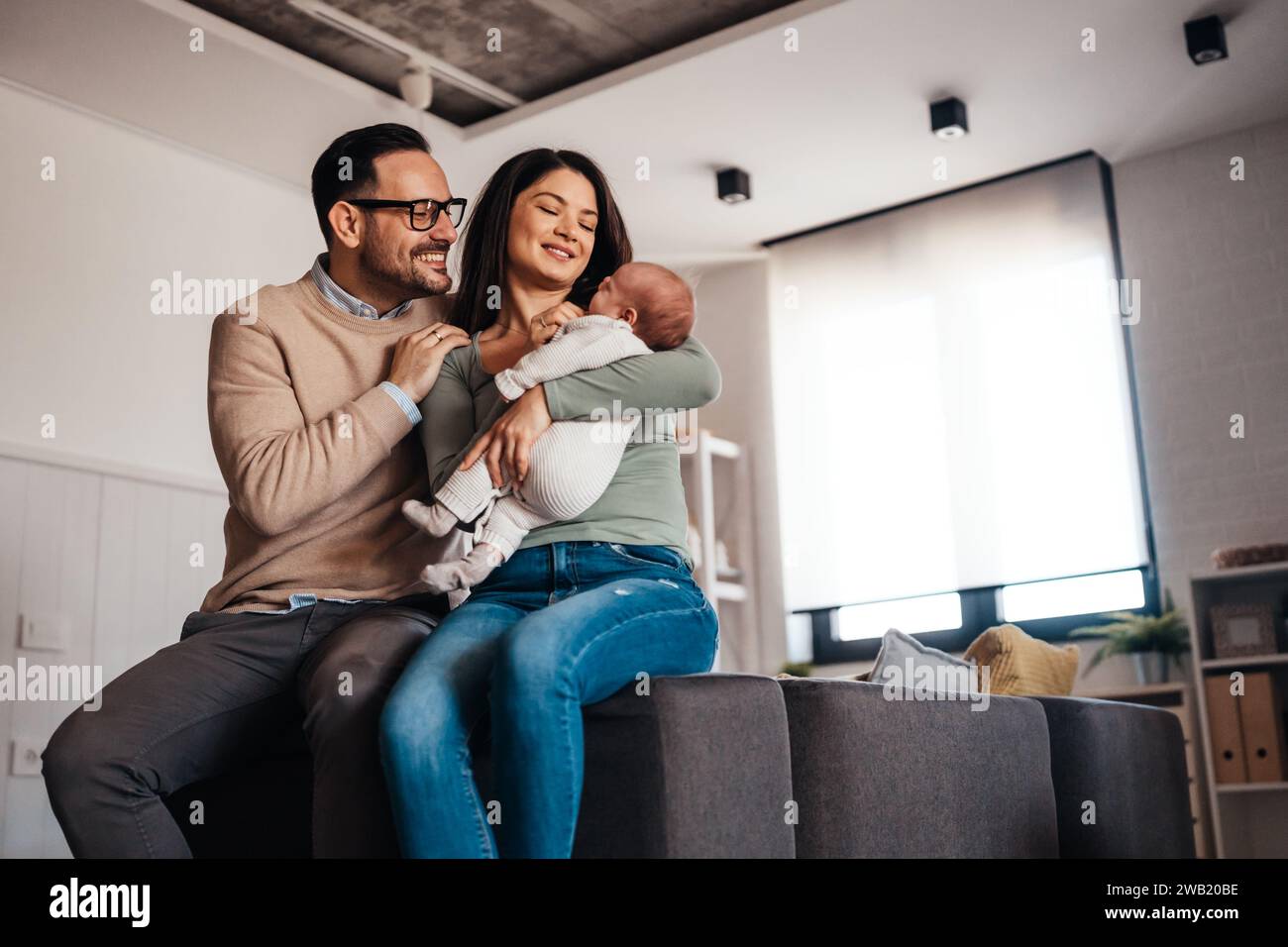 Family love parenthood baby concept. Parents spend happy moments with ...