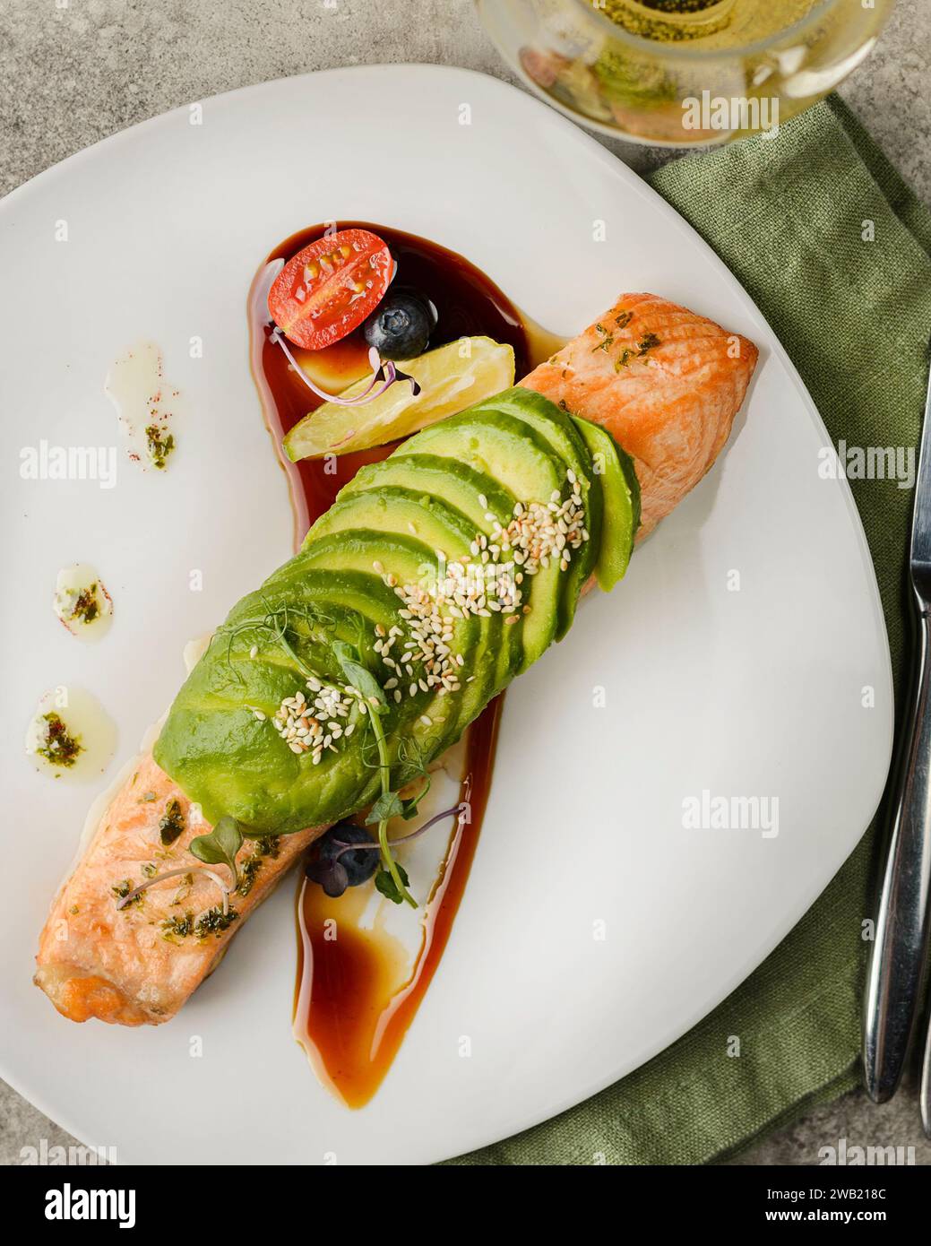 salmon with avocado on a plate. High quality photo Stock Photo