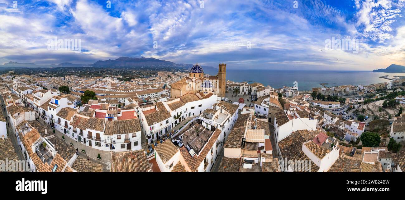Charmig coastal town Altea in popular coast of Spain Costa Blanca. aerial drone high angle  panoramic view with scenic cathedral, Valencia province Stock Photo