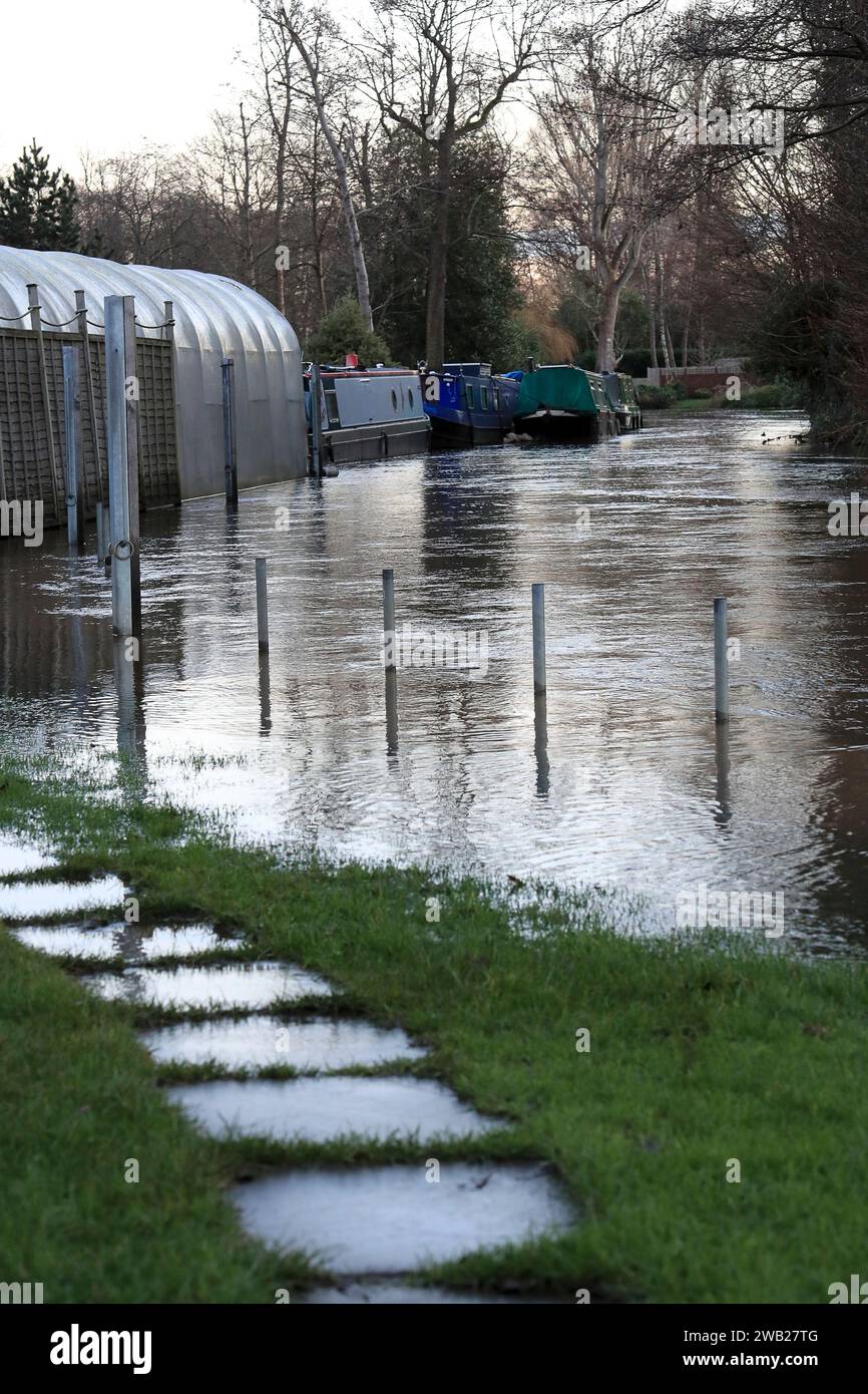 Catteshall Lane, Godalming. 07th January 2024. Rainfall from Storm Henk made its way through the river network over the last 48 hours leading to the River Wey bursting its banks at several points. Flooding at Catteshall Lock in Godalming in Surrey was one of the worst affected areas. Credit: james jagger/Alamy Live News Stock Photo