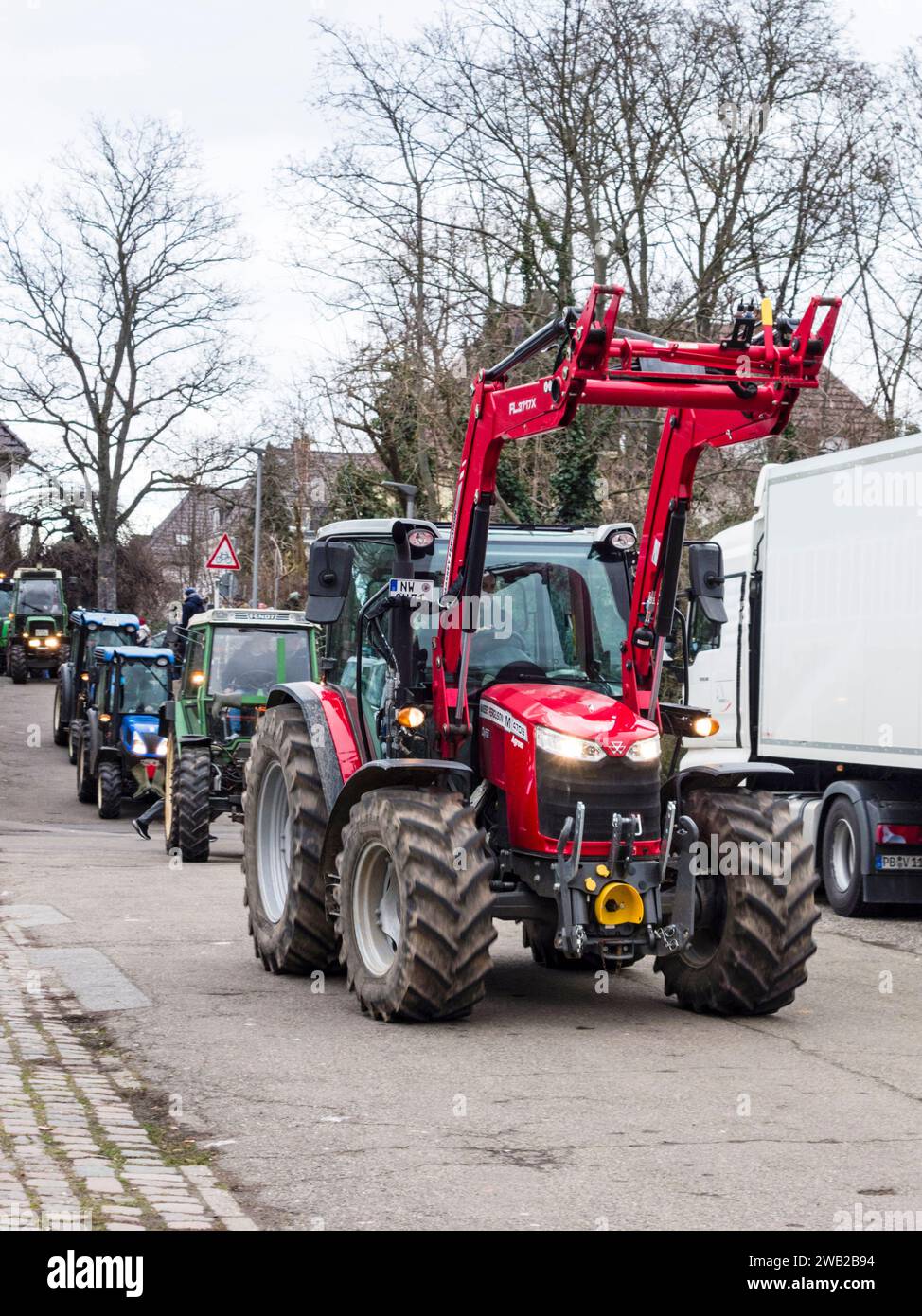 Farmer protests in Ludwigshafen/Germany: Agricultural producers protest against reform plans by the center-left government of Olaf Scholz (8 January 2024). The plans to cut tax benefits on diesel and agricultural machines has led to an outcry and unprecedented protest, with large tractor convoys forming in major cities. Stock Photo