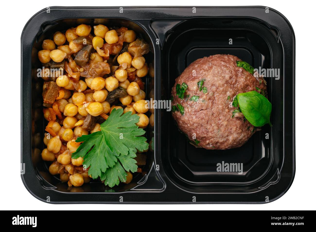 beef patty with side dish in lunch box on white background Stock Photo Alamy
