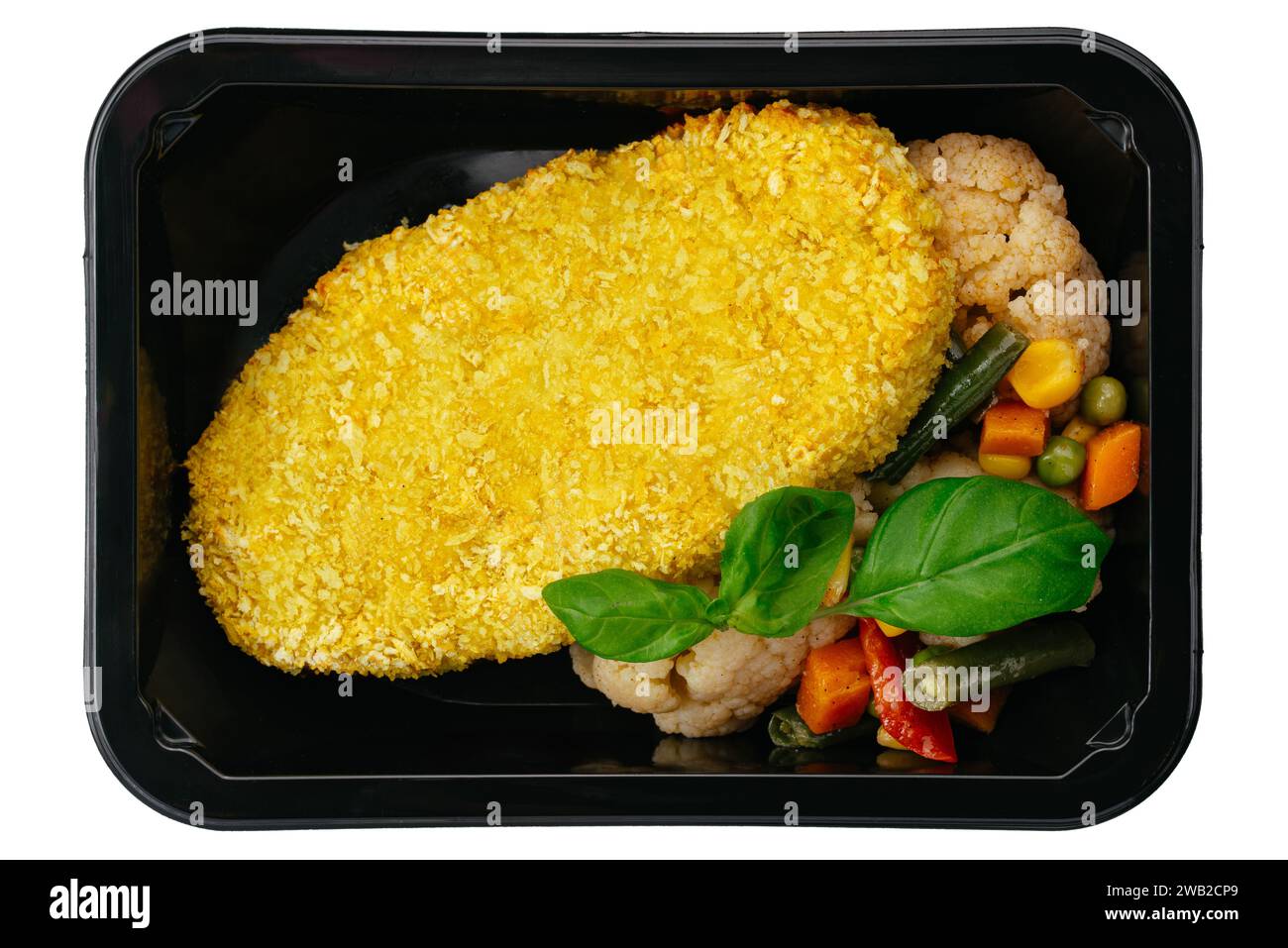 chicken schnitzel with side dish in a lunch box on a white background Stock Photo