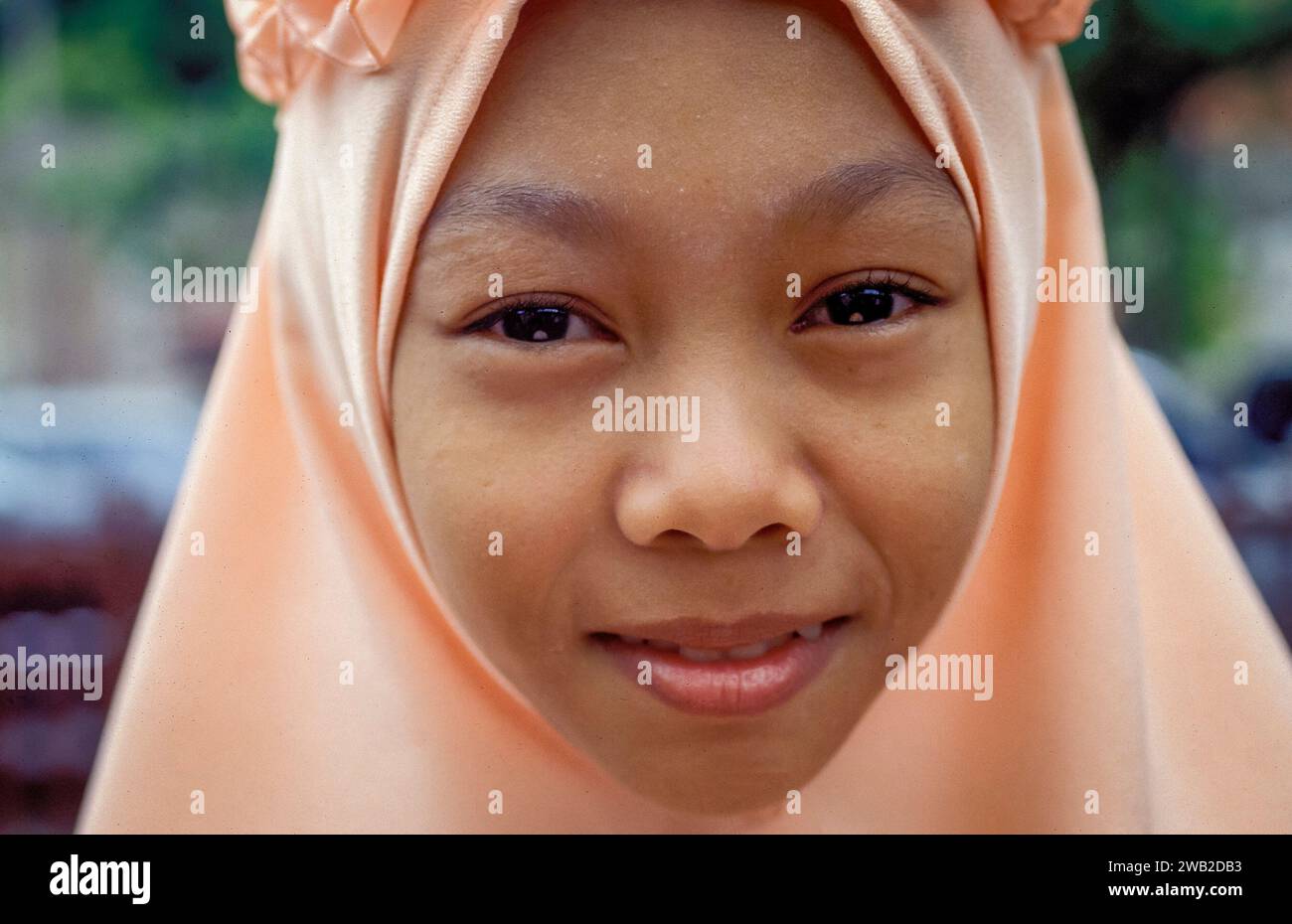 Indonesia, Java- Portrait of veiled girl. Stock Photo
